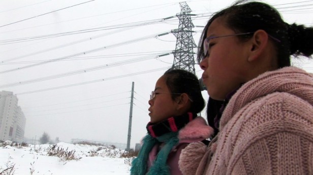 Two young Chinese girls from a migrant family that has relocated to a big city struggle to earn money to pay for their brother’s schooling and are forced to abandon their own studies, putting their futures in jeopardy in “When the Bough Breaks,” directed by Ji Dan, one of China’s preeminent female documentary filmmakers.   Celebrated Chinese artist, Hung Liu, will lead a conversation following the film’s March 21, 2013 screening at the New People Cinema at CAAMFest 2013.  Image: CAAMFest