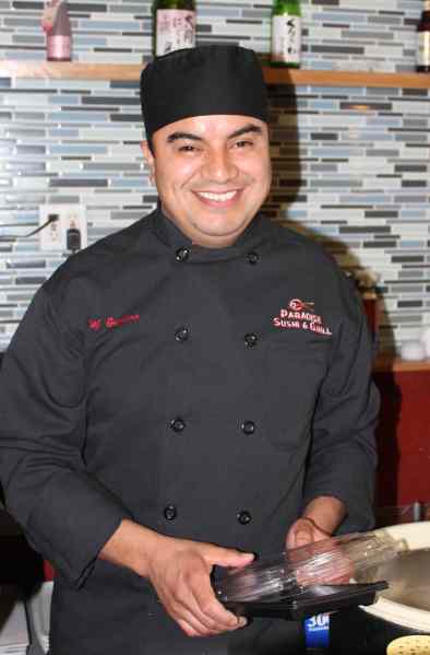 Gustavo Martinez, chef and owner of Paradise Sushi in Petaluma’s River Plaza, was trained by Japanese chefs in Lake Tahoe and has been a sushi chef for 16 years now.  After working in Santa Rosa, he opened is Petaluma restaurant in November 2012 and never looked back—his Petaluma clients are “much nicer” and his (sushi) bar is hopping on weekends. His ceviche roll, a creative shout out to his Mexican heritage, is a spicy fusion of salmon, serrano peppers, and avocado topped with several varieties of fish, red onions, wine, lime juice & cilantro. Photo: Geneva Anderson