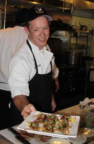 Executive Chef Joe O’Donnell often puts in 15 hours days at Seared and they are paying off—it’s the best steak house in town.  Celebrating its one year anniversary this August, Seared, 170 Petaluma Blvd. North, occupies the space that Graziano’s had for over 30 years.  O’Donnell’s pedigree includes Scottsdale’s Le Cordon Bleu and cooking stints in San Francisco, Sausalito, Olema, and years spent helping out at McNears, owned by his father Ken O’Donnell, also a partner in Seared.   “We’re trying to take a different approach to the steak house mentality here. We do a lot of interesting small plates and top quality servings of great meats and fishes.”  Seared is serving chili pepper cod aquachili with avocado, cilantro, on a crisp tortilla with pickled onion AND Wagyu New York tataki on a crispy Kennebec potato chip.  Photo: Geneva Anderson